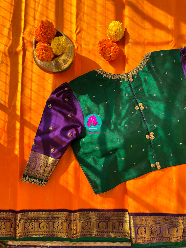 Pure Kanchipattu handloom saree in traditional peacock motifs paired with hand embroidered blouse