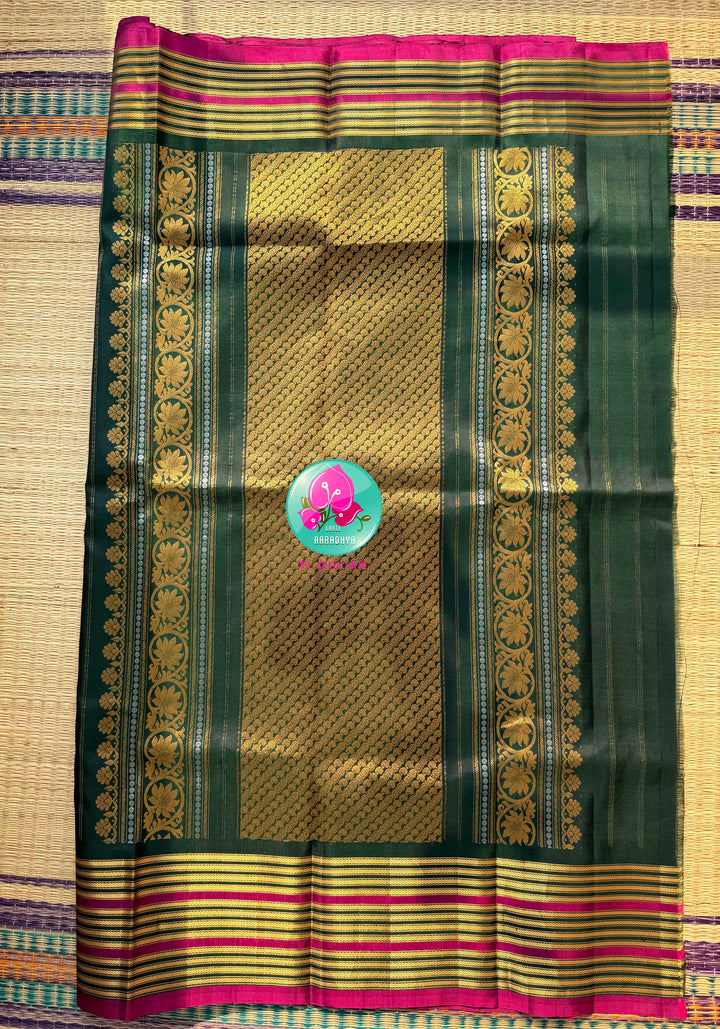 The Emerald Heritage: Pure Handloom Gadwal Saree in Bottle Green with Bandhani Fusion