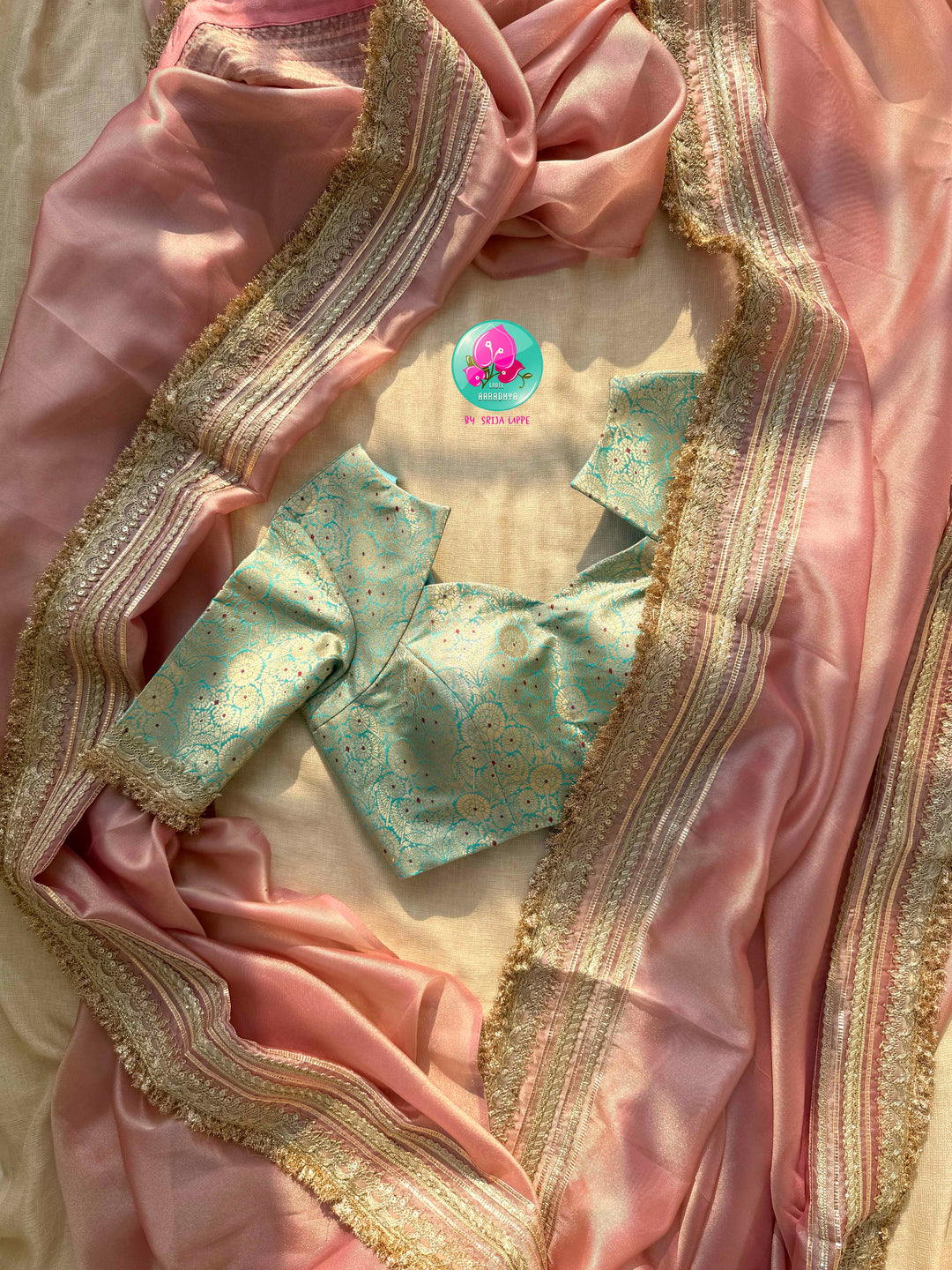 The Rose Quartz Radiance: Light Pink Gold Tissue Organza Saree with Sea Green Brocade blouse