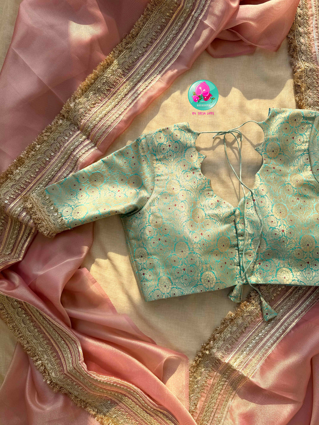 The Rose Quartz Radiance: Light Pink Gold Tissue Organza Saree with Sea Green Brocade blouse