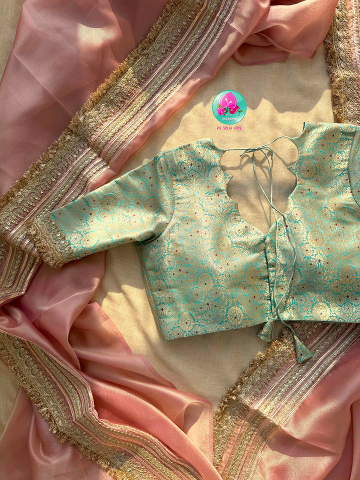 The Rose Quartz Radiance: Light Pink Gold Tissue Organza Saree with Sea Green Brocade blouse