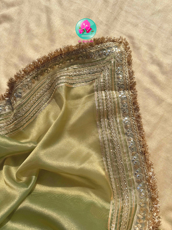 The Minted Glimmer: Light Green Gold Tissue Organza Saree with Bottle Green Brocade Artistry