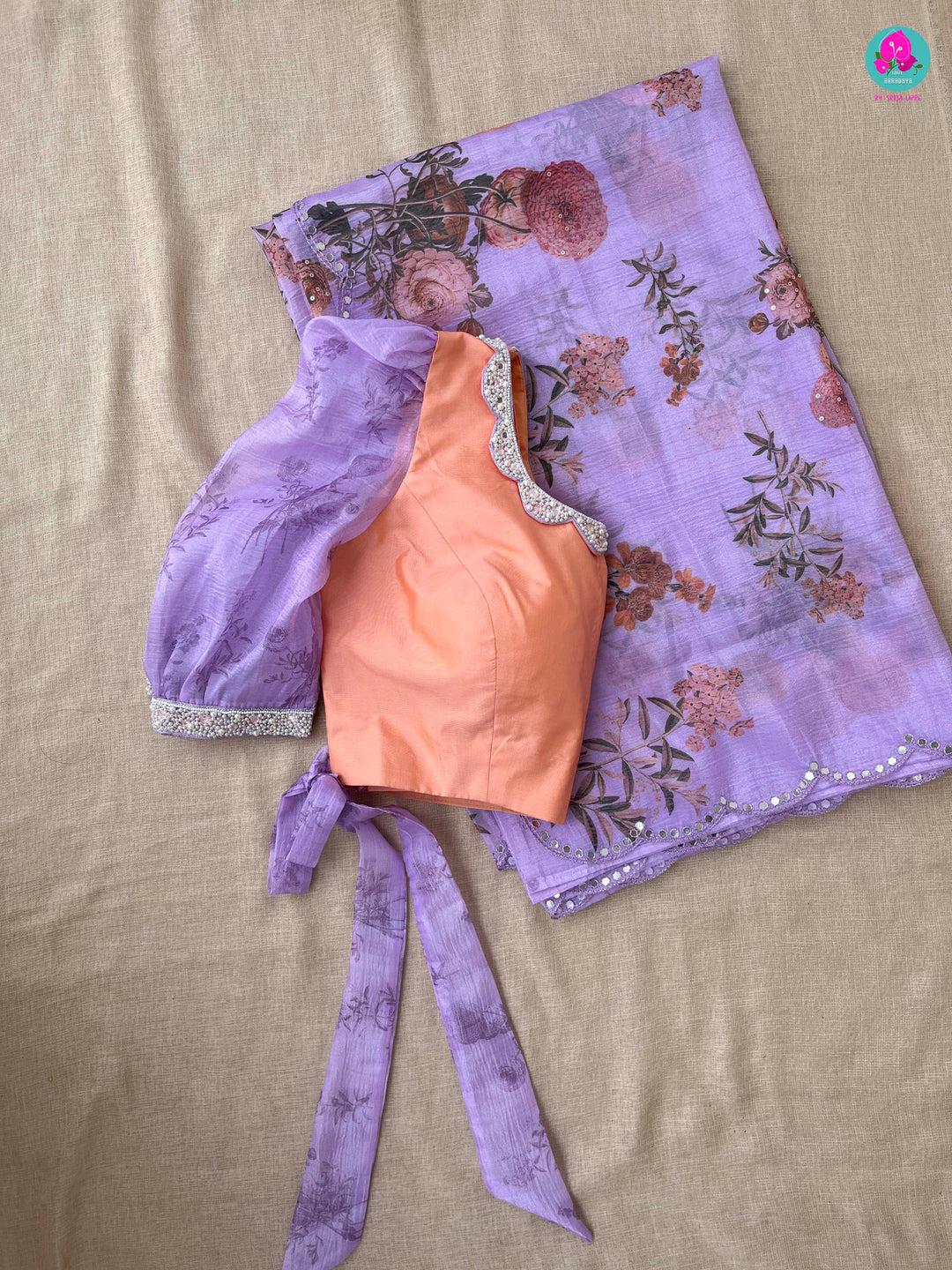 Soft crushed floral organza silk saree paired with designer embroidered blouse