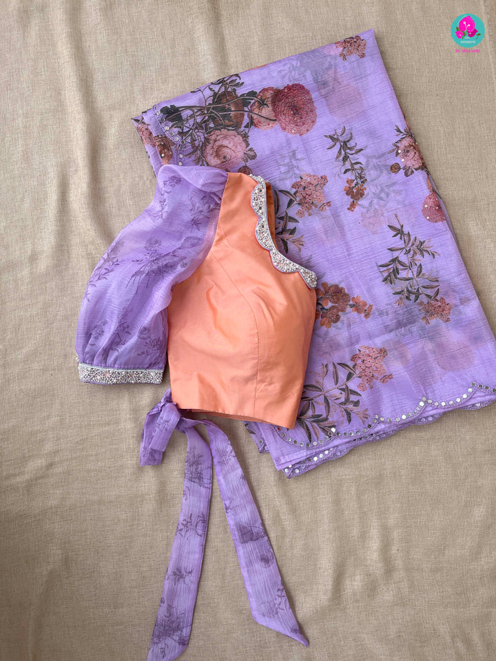 Soft crushed floral organza silk saree paired with designer embroidered blouse