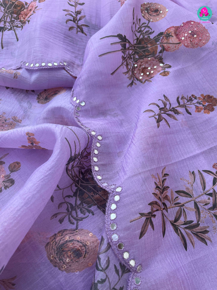 Soft crushed floral organza silk saree paired with designer embroidered blouse