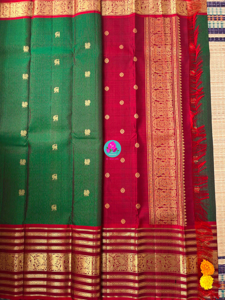 The Eternal Classic: Emerald Green Vaira Oosi Kanchipattu Saree with Grand Crimson Border