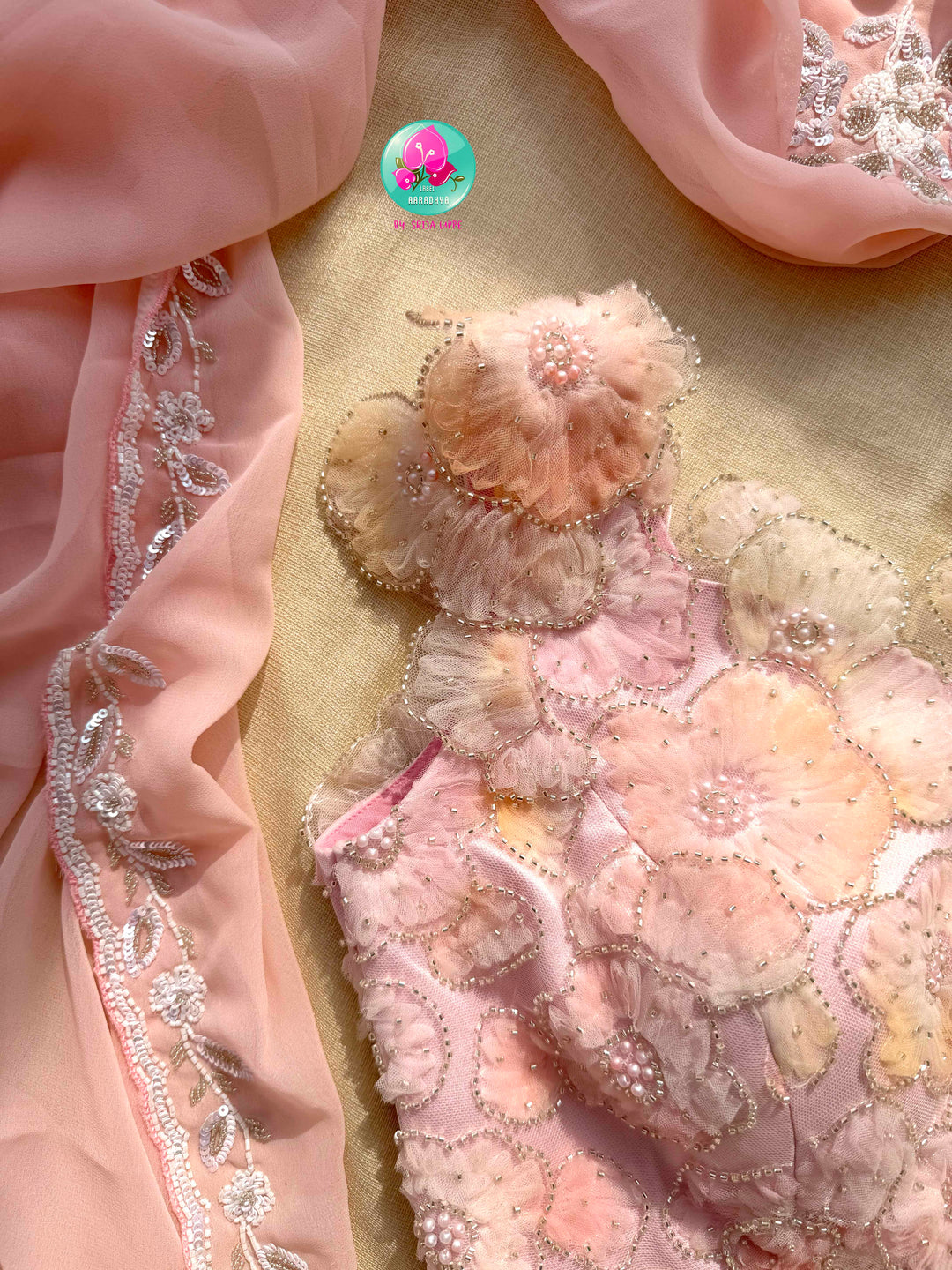 The Peach Macaron Whisper: Hand-Embroidered Georgette Saree with Embellished Net Artistry