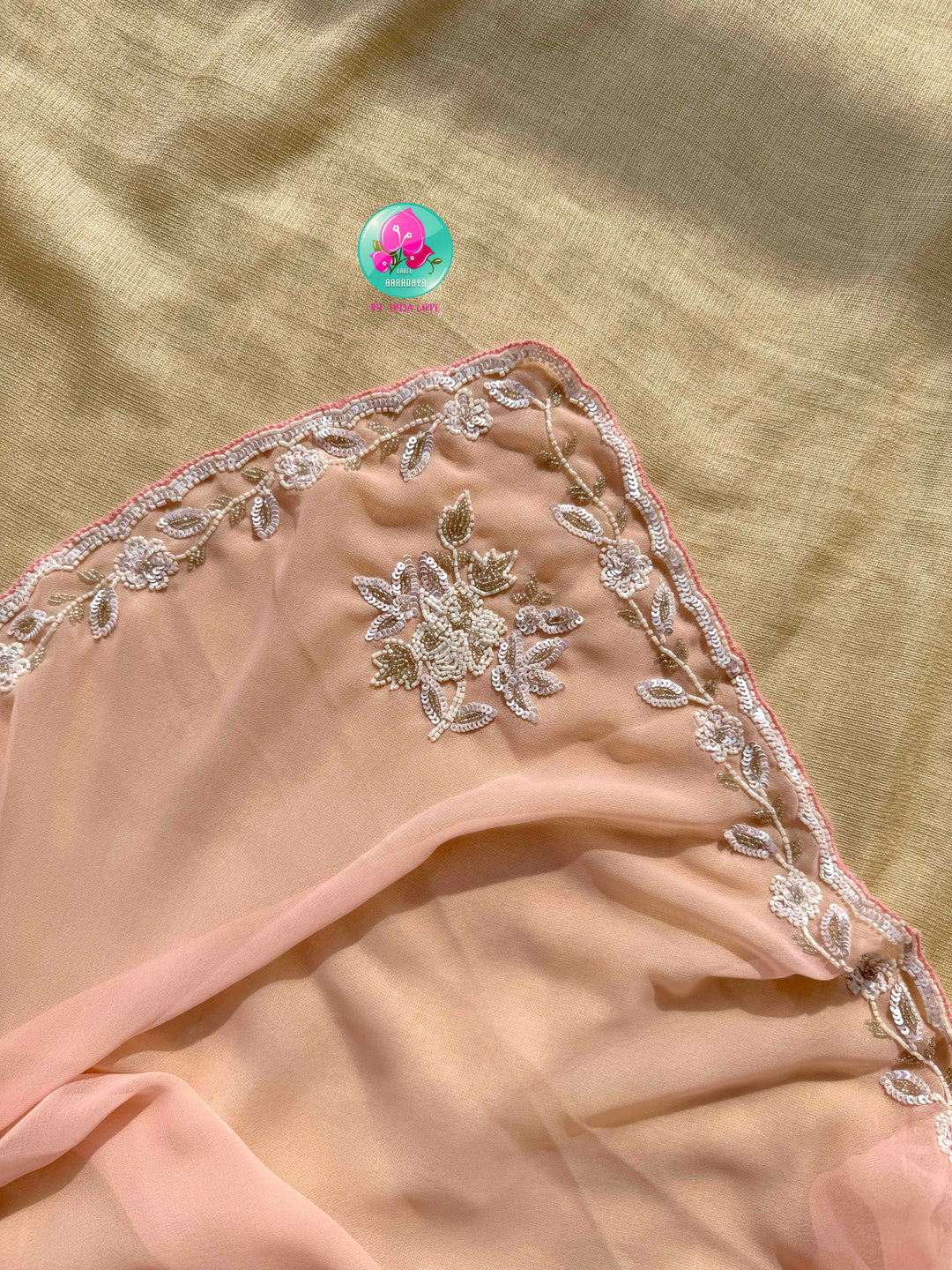 The Peach Macaron Whisper: Hand-Embroidered Georgette Saree with Embellished Net Artistry