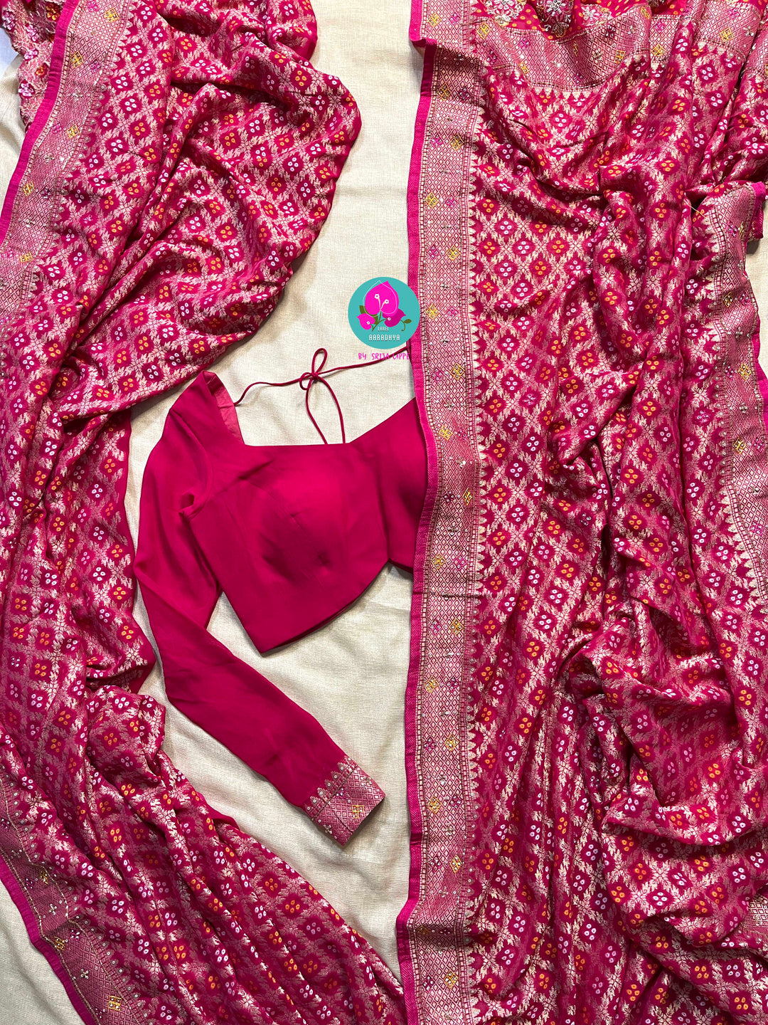 Hand embroidered georgette saree in Bandhani style with designer blouse
