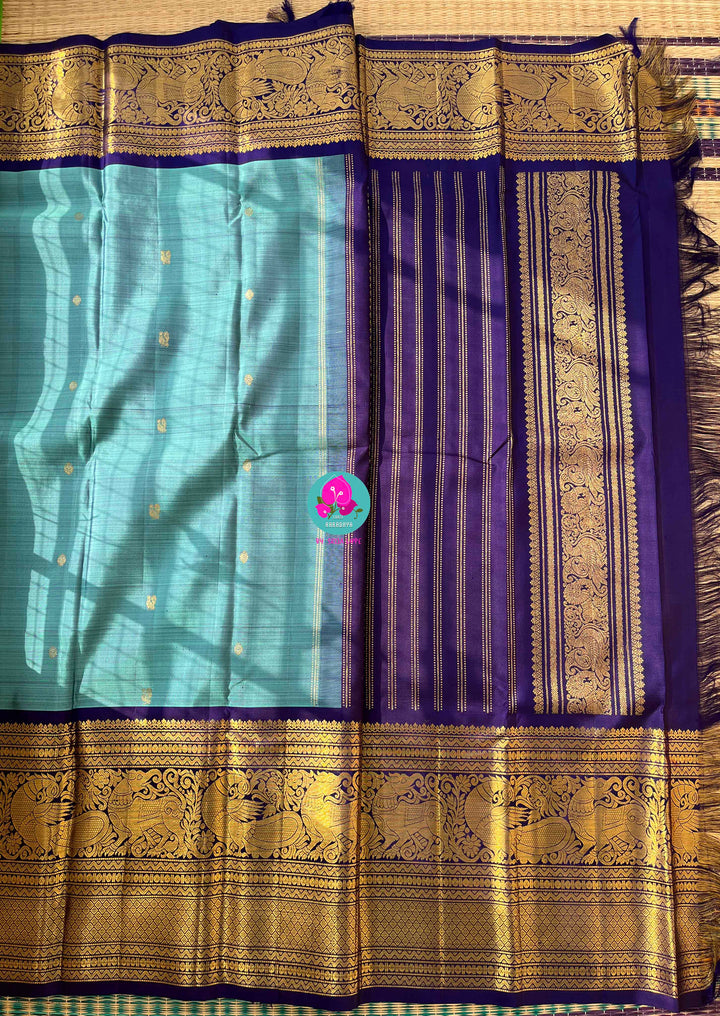 A Tale of Two Blues: Vintage Teal Kanchipattu Saree with Majestic Midnight Navy Border