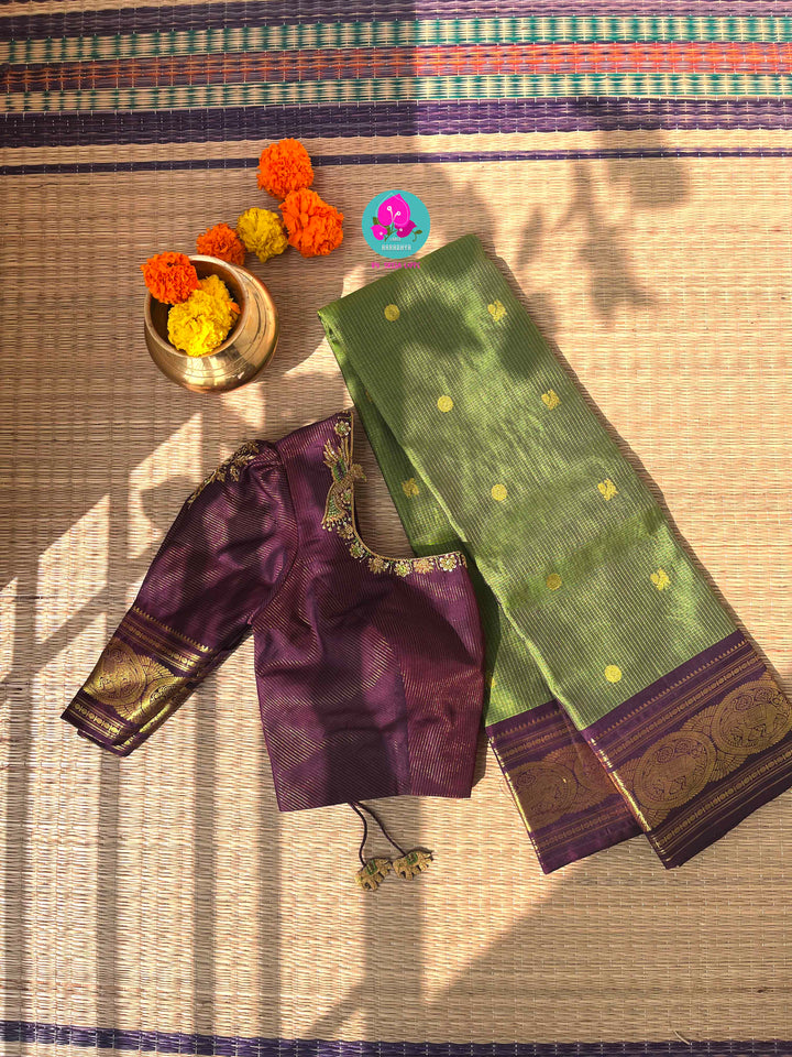 Nature’s Royalty: Olive Green Vaira Oosi Silk Saree with Deep Plum Border & Elephant Tassels
