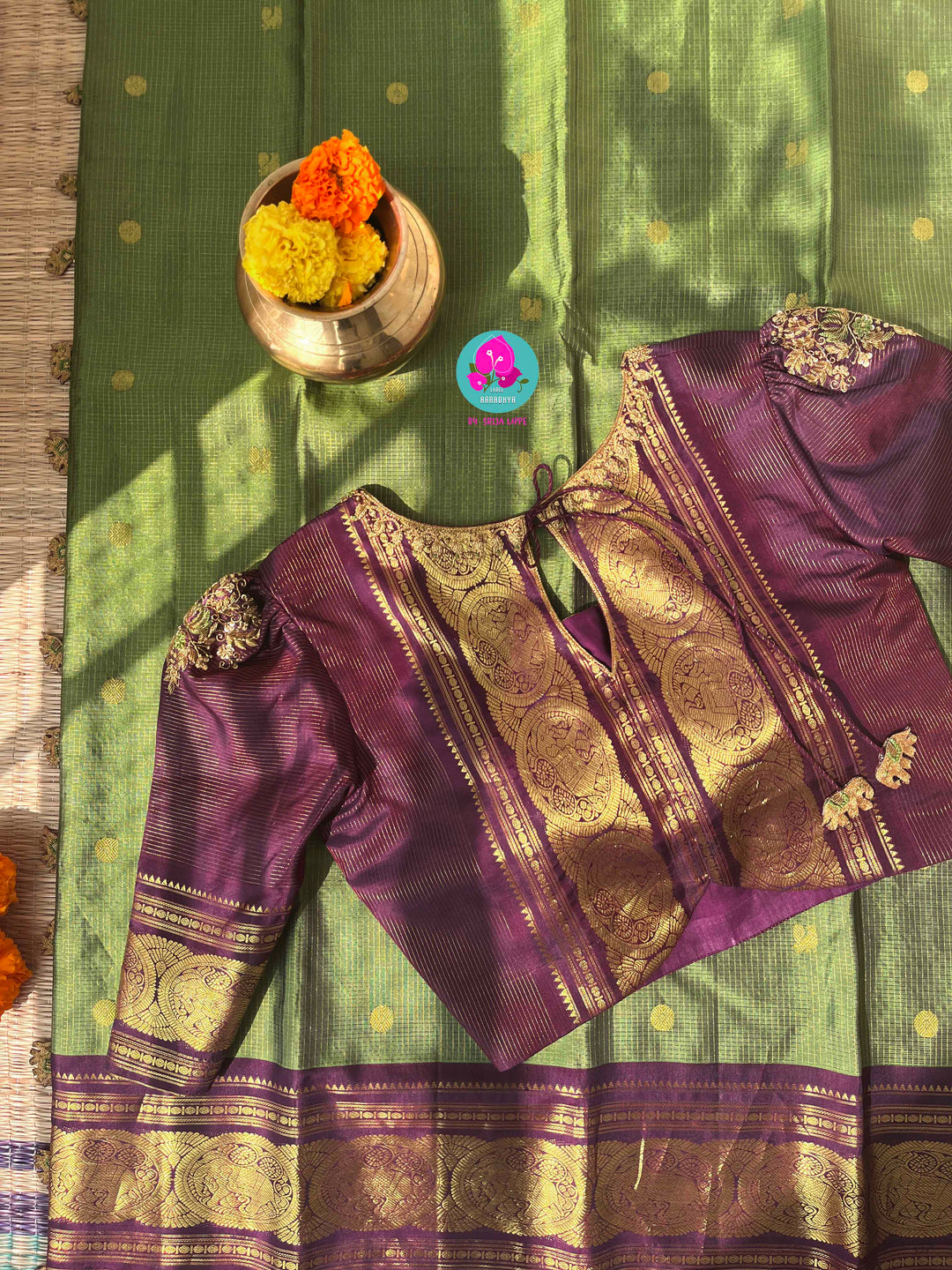Nature’s Royalty: Olive Green Vaira Oosi Silk Saree with Deep Plum Border & Elephant Tassels