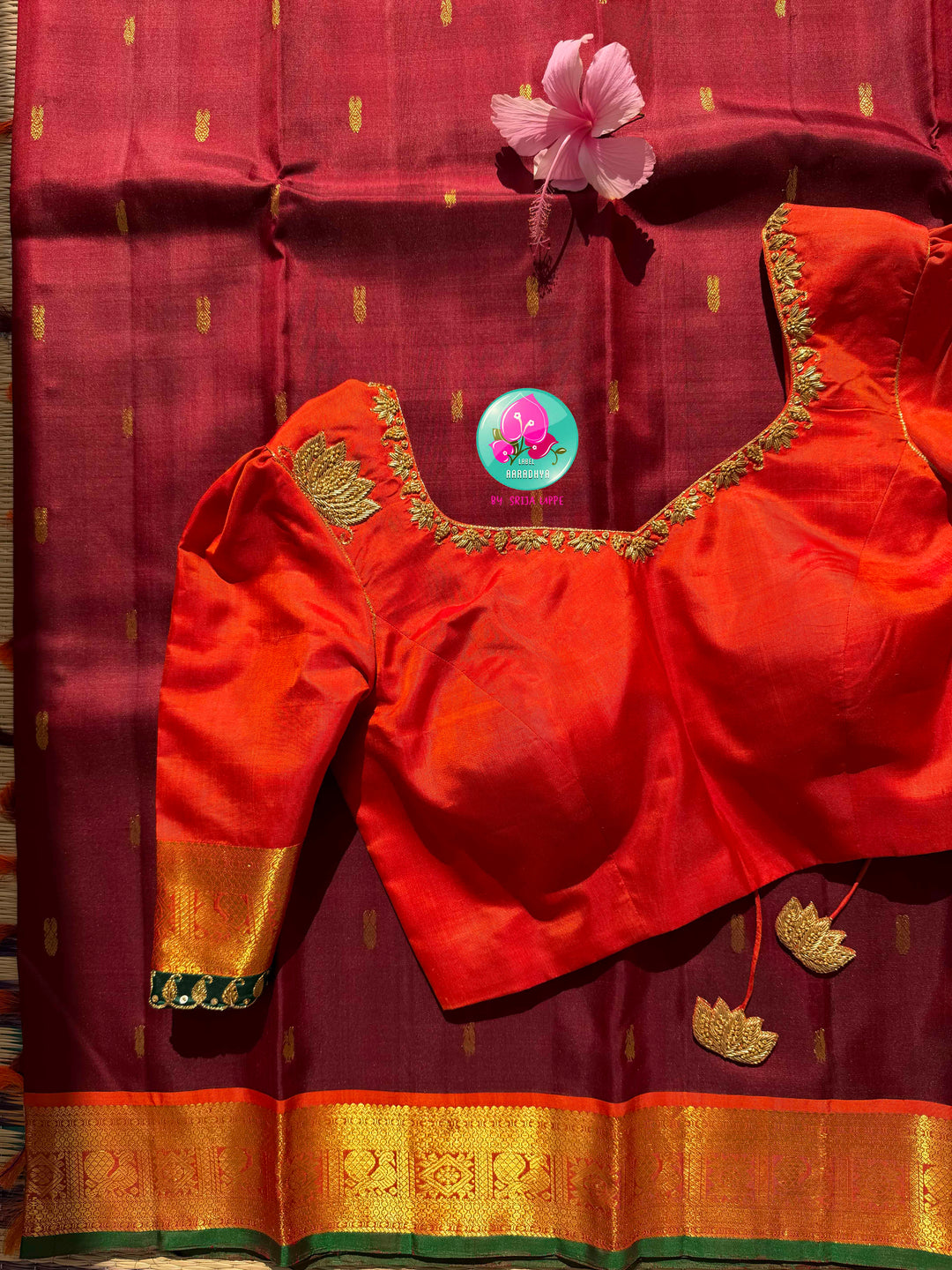 The Crimson Hearth: Maroon Kanchipattu Saree with Radiant Orange Artistry