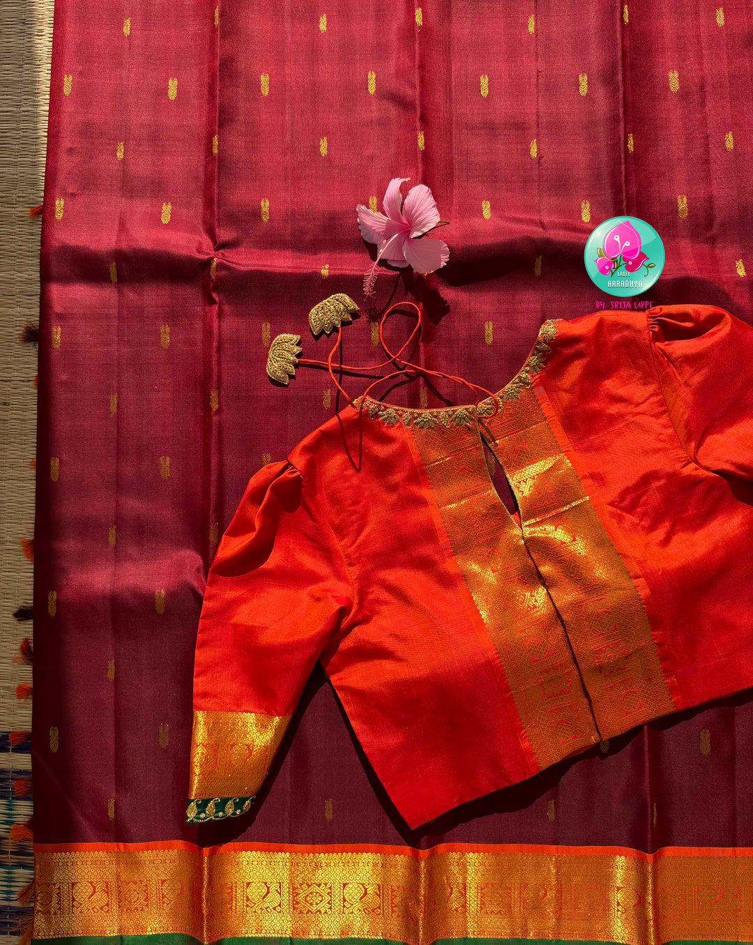 The Crimson Hearth: Maroon Kanchipattu Saree with Radiant Orange Artistry