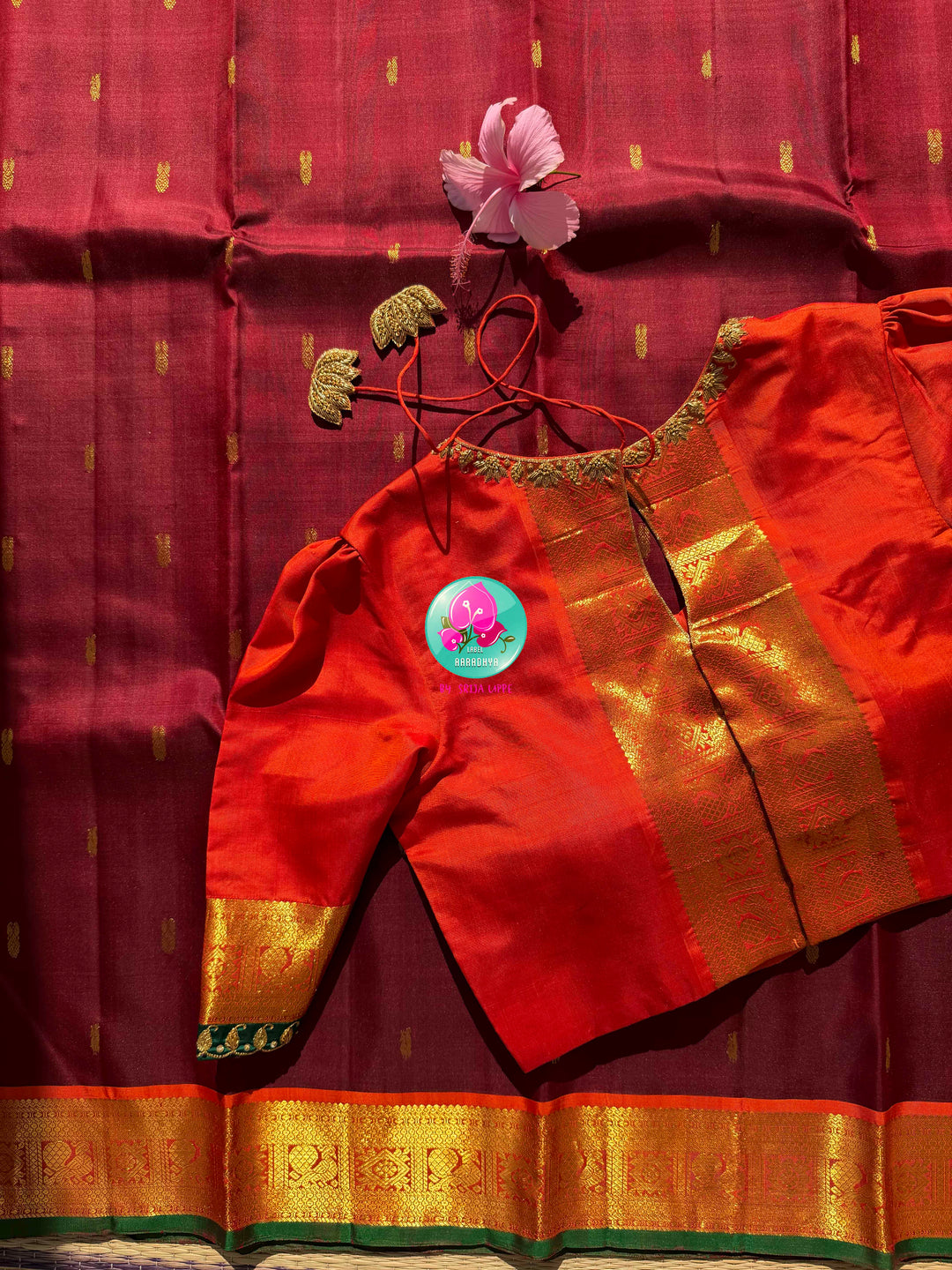 The Crimson Hearth: Maroon Kanchipattu Saree with Radiant Orange Artistry