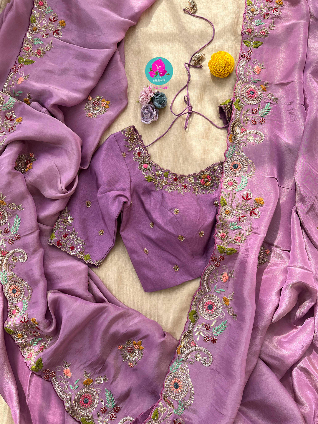 Hand embroidered soft and flowy tissue georgette saree with hand embroidered blouse