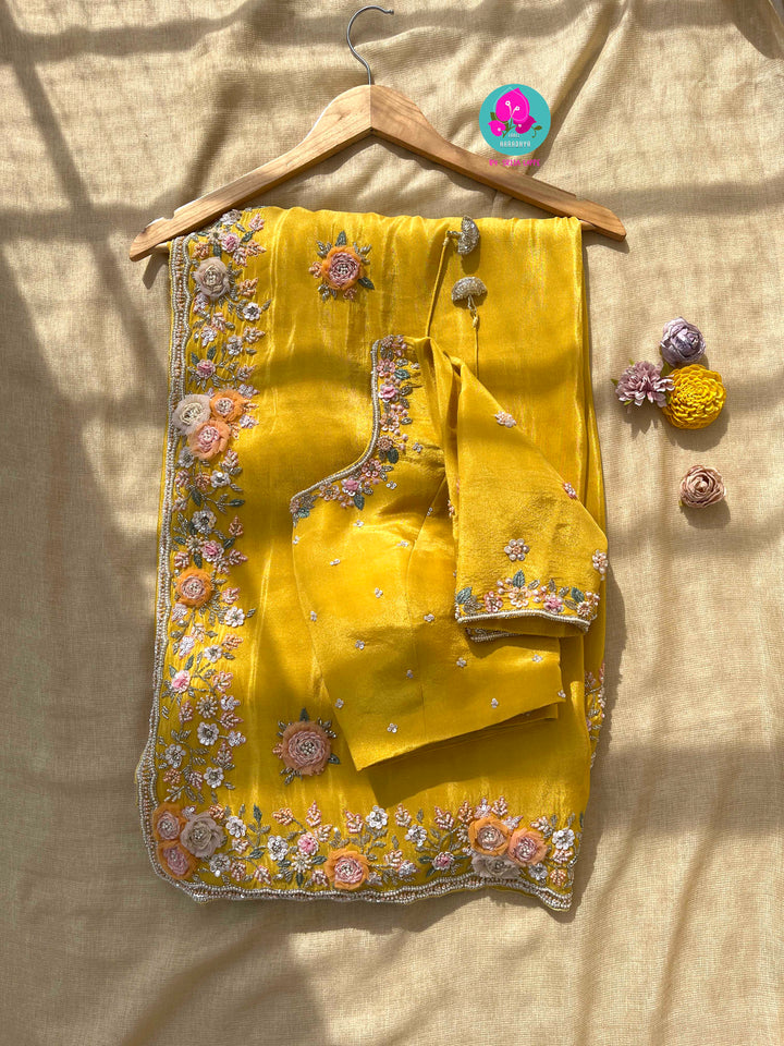 Yellow soft tissue georgette saree with Handmade appliqué flowers with hand embroidered blouse