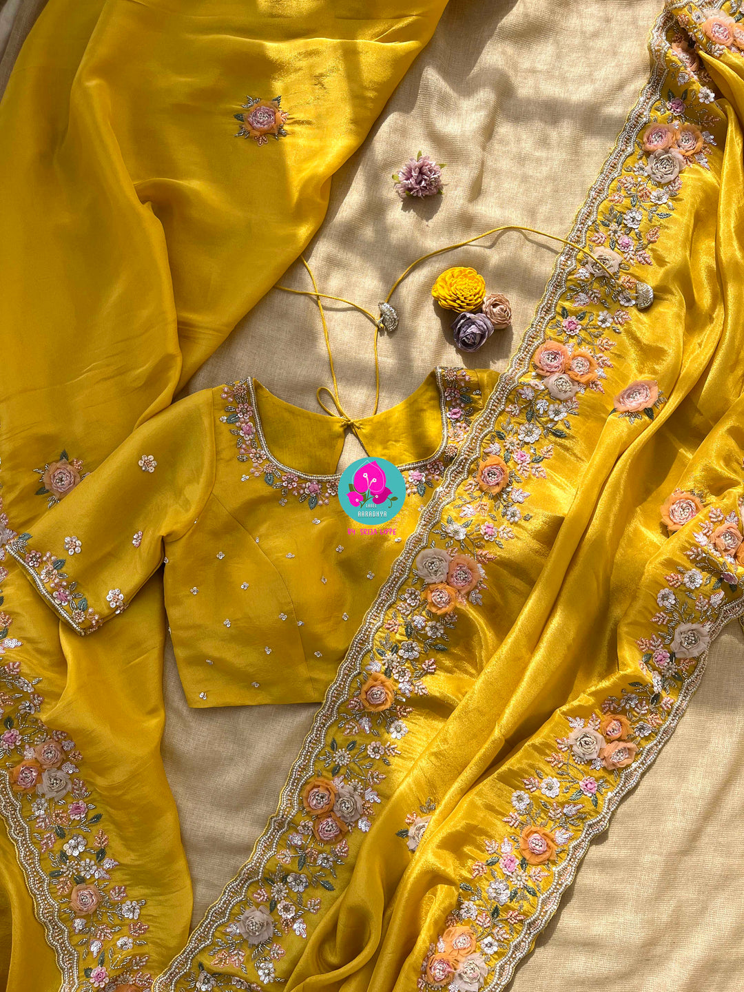 Yellow soft tissue georgette saree with Handmade appliqué flowers with hand embroidered blouse