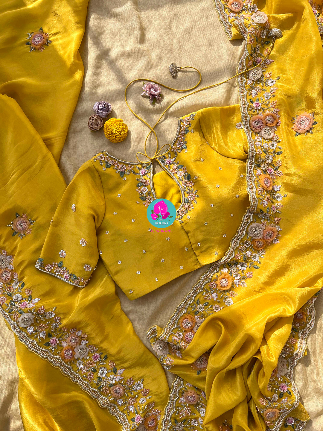 Yellow soft tissue georgette saree with Handmade appliqué flowers with hand embroidered blouse