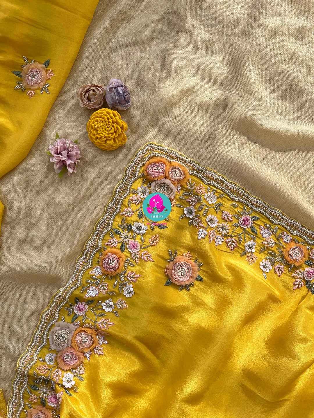 Yellow soft tissue georgette saree with Handmade appliqué flowers with hand embroidered blouse
