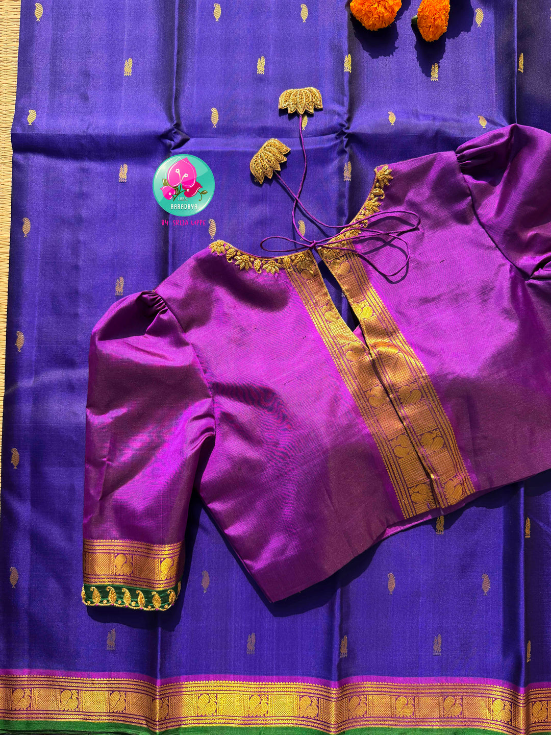 The Sapphire Sovereign: Royal Blue Kanchipattu Saree with Purple Hand-Embroidered Artistry