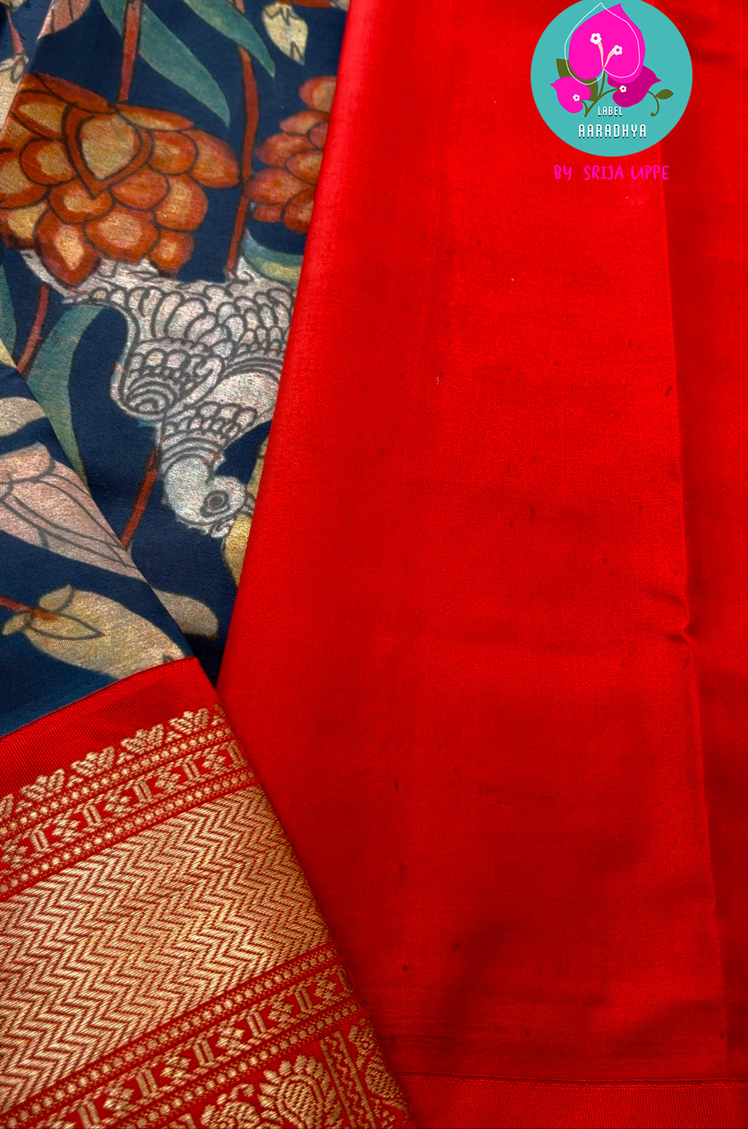 Blue kalamkari printed saree with red border