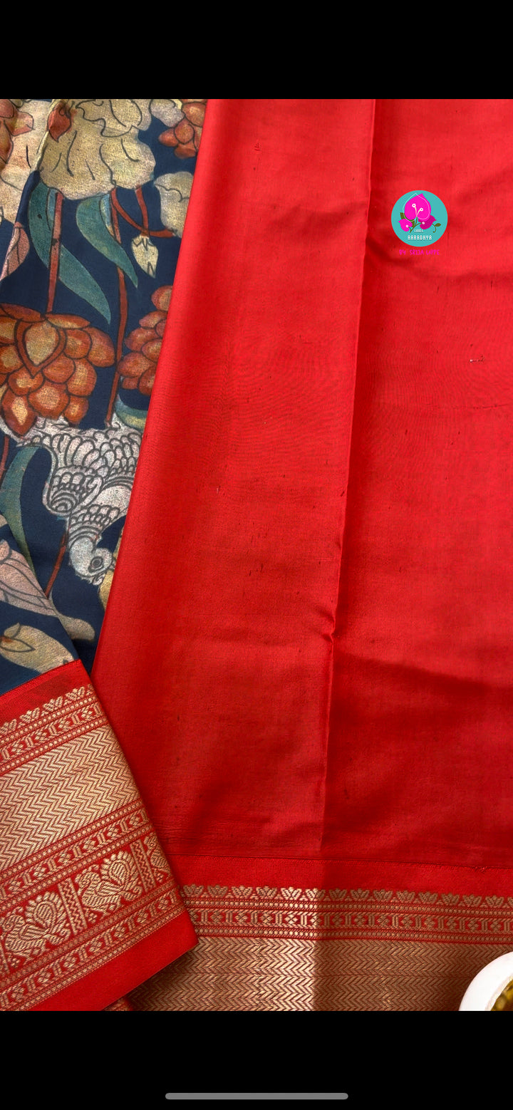Blue kalamkari printed saree with red border