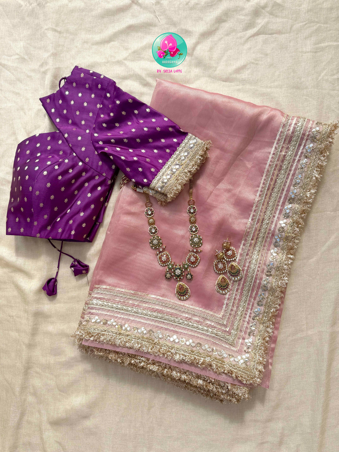 Gilded Romance: The Rose Gold Tissue & Royal Purple Brocade Paired with Sabyasachi-inspired fashion jewelry set