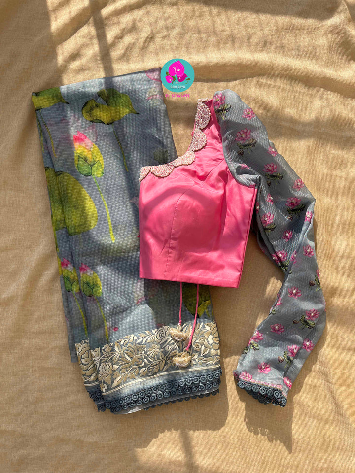 Kota silk saree in pretty floral design With embroidery at border paired with full sleeves blouse