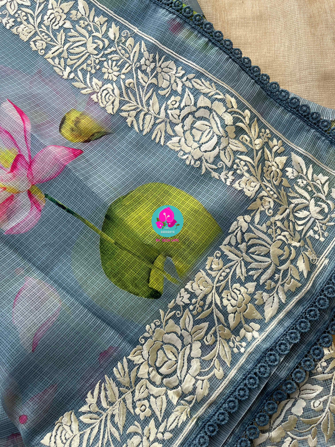 Kota silk saree in pretty floral design With embroidery at border paired with full sleeves blouse