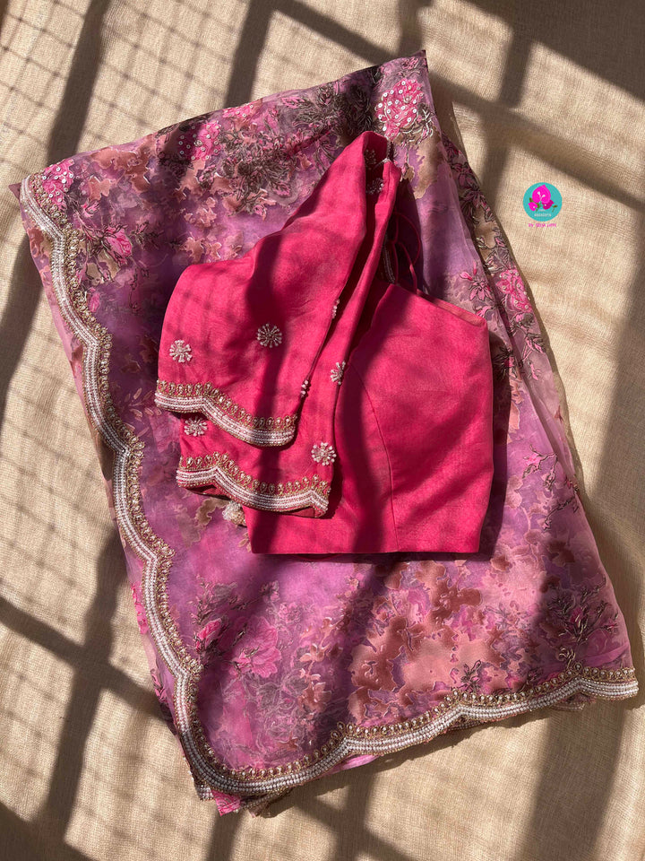 Brasso organza saree with hand embroidery paired with hand embroidered stitched blouse