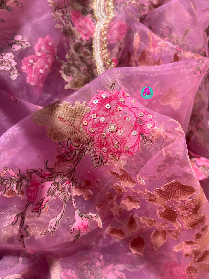 Brasso organza saree with hand embroidery paired with hand embroidered stitched blouse