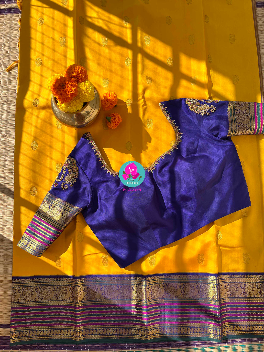 Suvarna Ganneru Splendor: Vintage Yellow Kanchipattu Saree with Artisan Blue Blouse