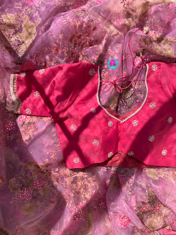 Brasso organza saree with hand embroidery paired with hand embroidered stitched blouse