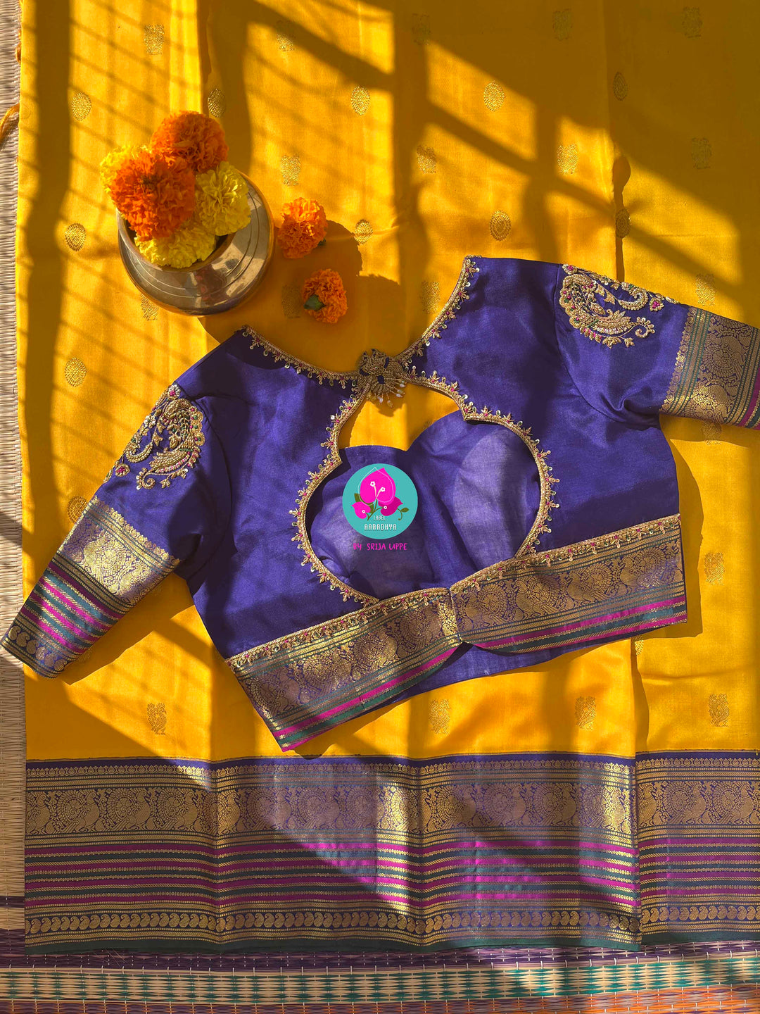 Suvarna Ganneru Splendor: Vintage Yellow Kanchipattu Saree with Artisan Blue Blouse