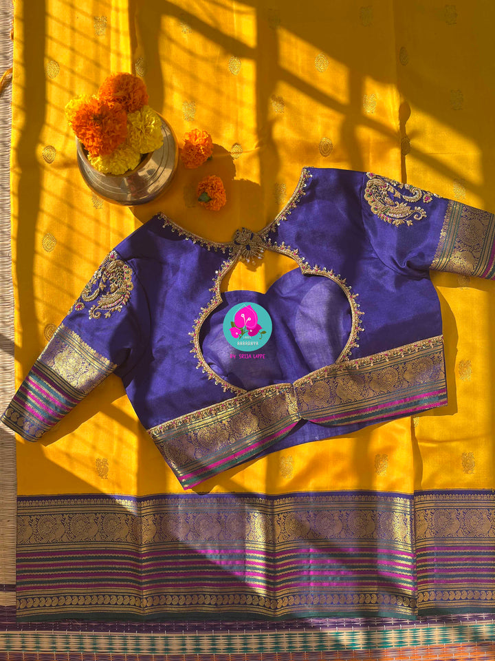 Suvarna Ganneru Splendor: Vintage Yellow Kanchipattu Saree with Artisan Blue Blouse