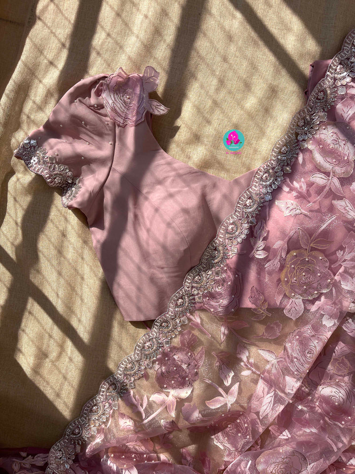 Brasso organza saree with hand embroidery paired with hand embroidered stitched blouse