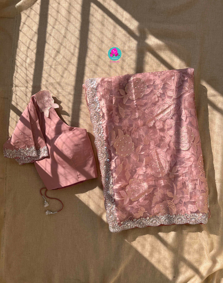 Brasso organza saree with hand embroidery paired with hand embroidered stitched blouse
