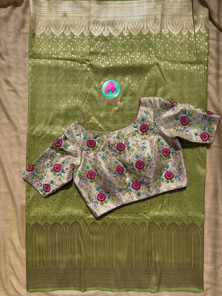 Luminous Pastel Brocade: Pista Green All-Over Woven Banarasi Silk Saree with Silver Brocade Statement Floral Embroidered Blouse