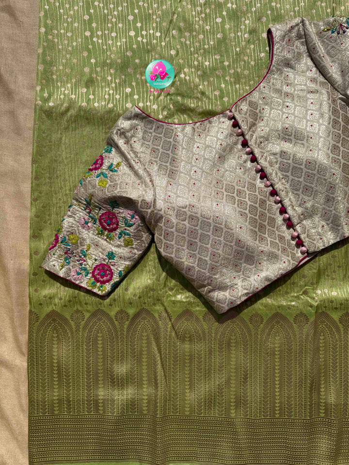 Luminous Pastel Brocade: Pista Green All-Over Woven Banarasi Silk Saree with Silver Brocade Statement Floral Embroidered Blouse