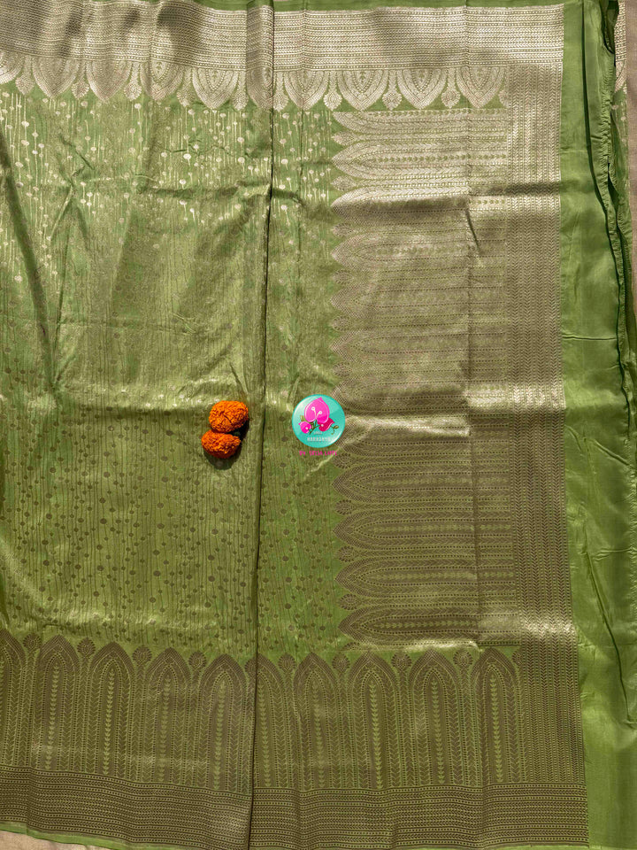Luminous Pastel Brocade: Pista Green All-Over Woven Banarasi Silk Saree with Silver Brocade Statement Floral Embroidered Blouse