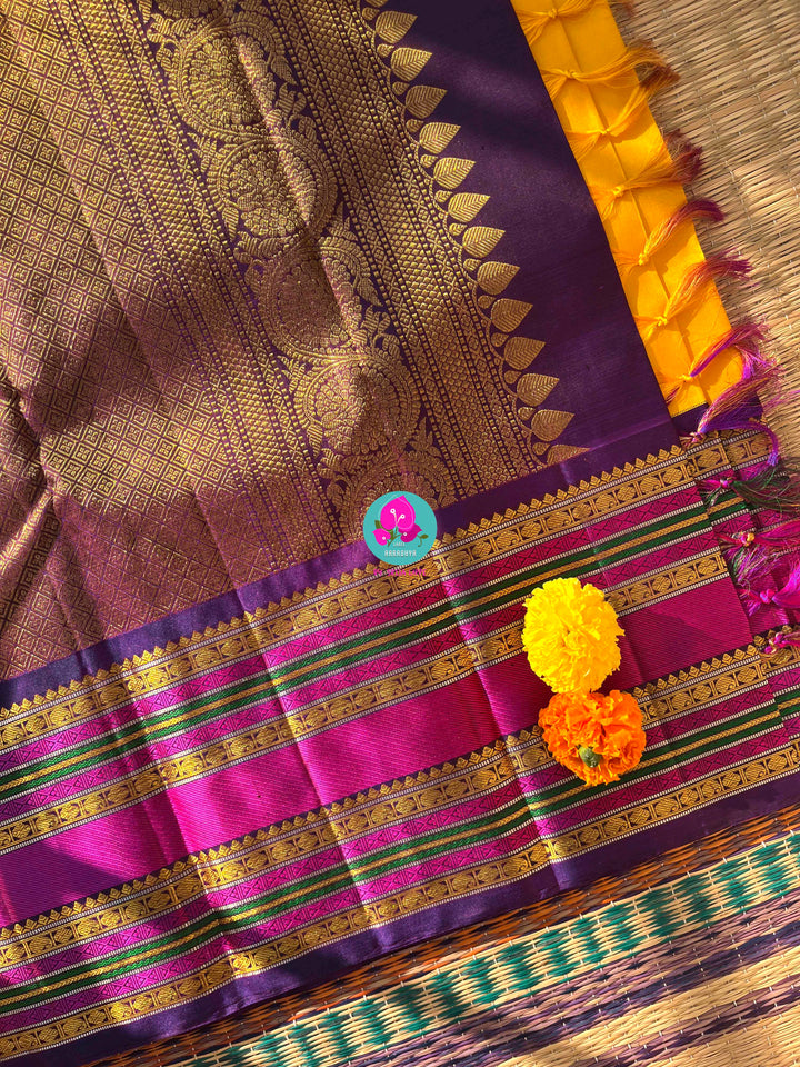 2G Zari Pure Kanchipuram saree with Yellow paired with hand embroidered contrast blouse