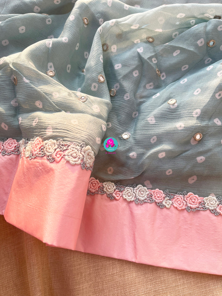Pure Natural Crape Saree with Mirror Work and Rosy Floral border Paired with blouse