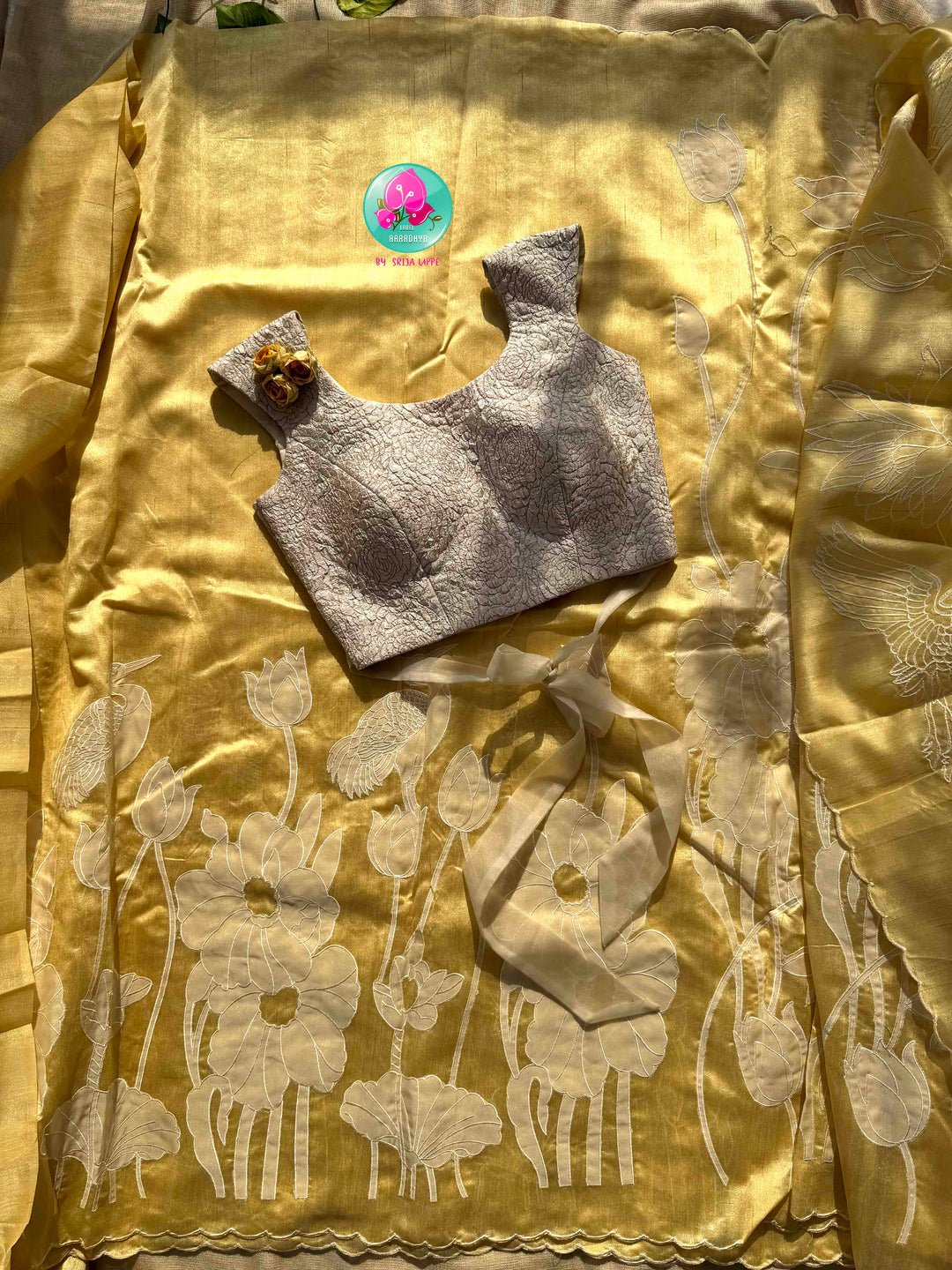 Artisanal Botanical Elegance: Sunshine Yellow Tussar Silk Saree with Off-White Floral Appliqué & Rose-Embossed Statement Blouse