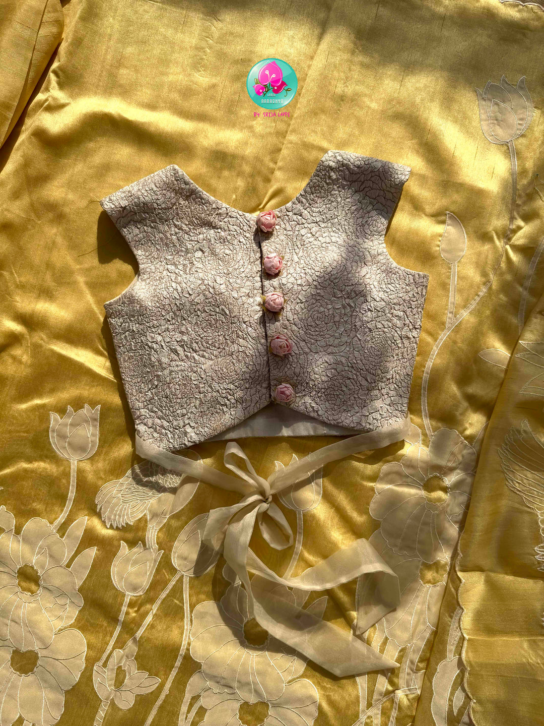 Artisanal Botanical Elegance: Sunshine Yellow Tussar Silk Saree with Off-White Floral Appliqué & Rose-Embossed Statement Blouse