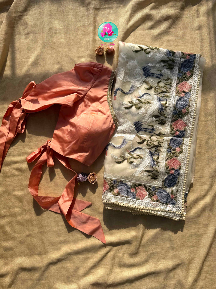 Tropical Serenade: The Off-White Flamingo Organza Saree