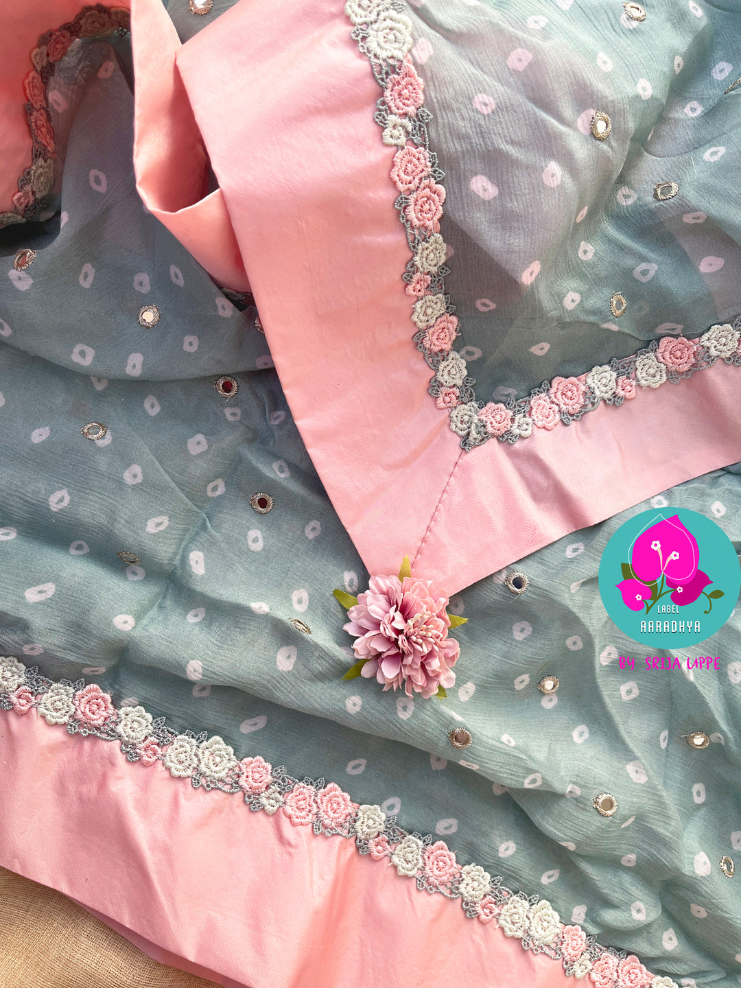 Pure Natural Crape Saree with Mirror Work and Rosy Floral border Paired with blouse