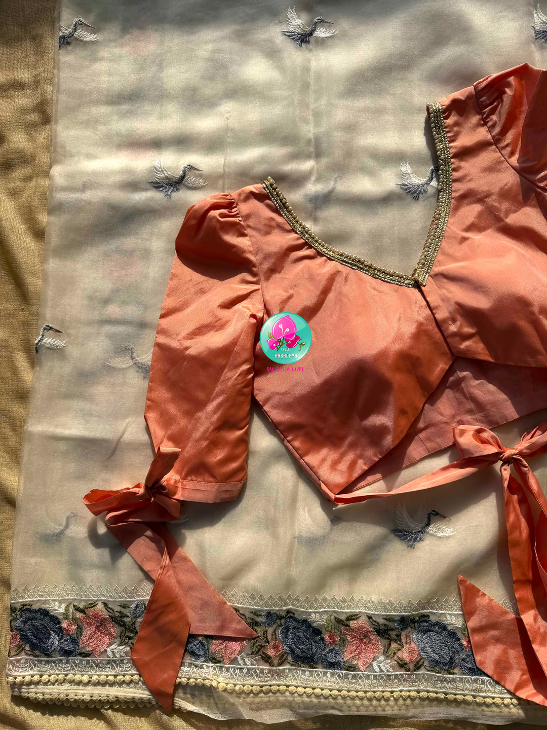 Tropical Serenade: The Off-White Flamingo Organza Saree