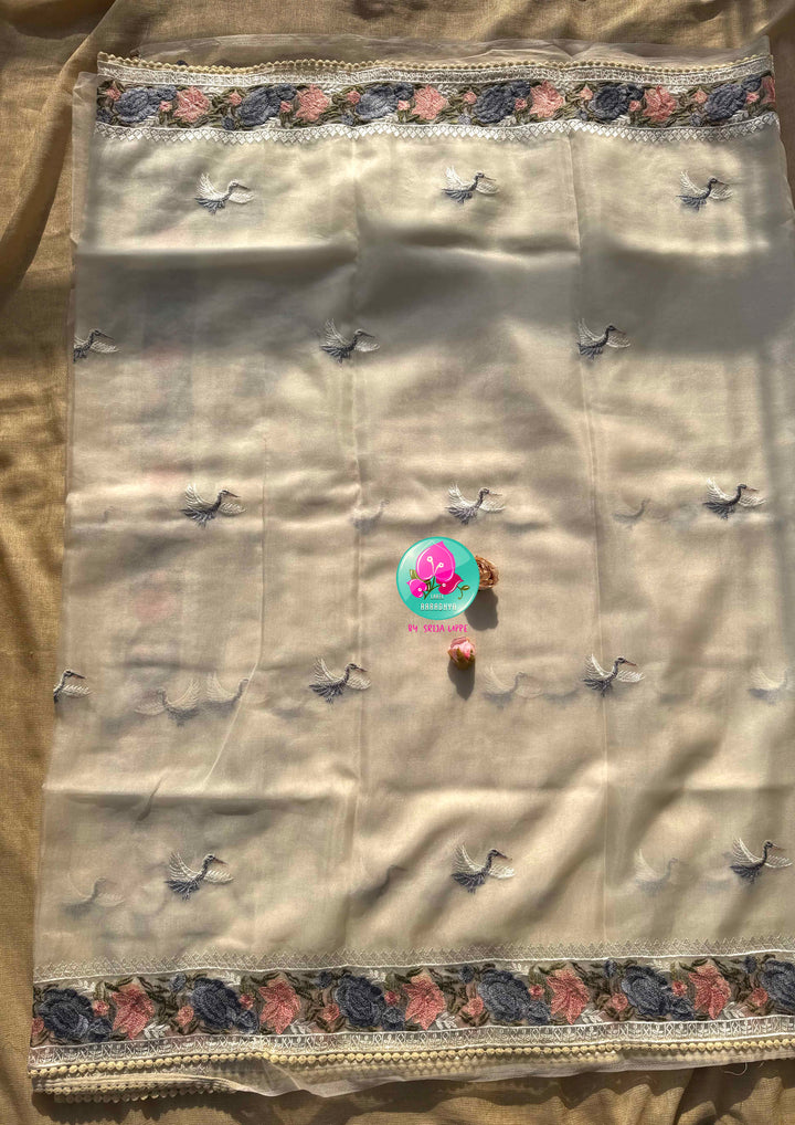 Tropical Serenade: The Off-White Flamingo Organza Saree