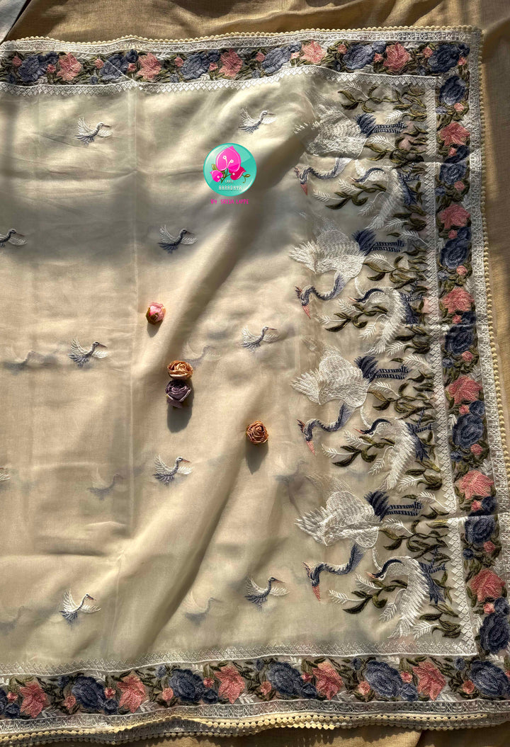Tropical Serenade: The Off-White Flamingo Organza Saree